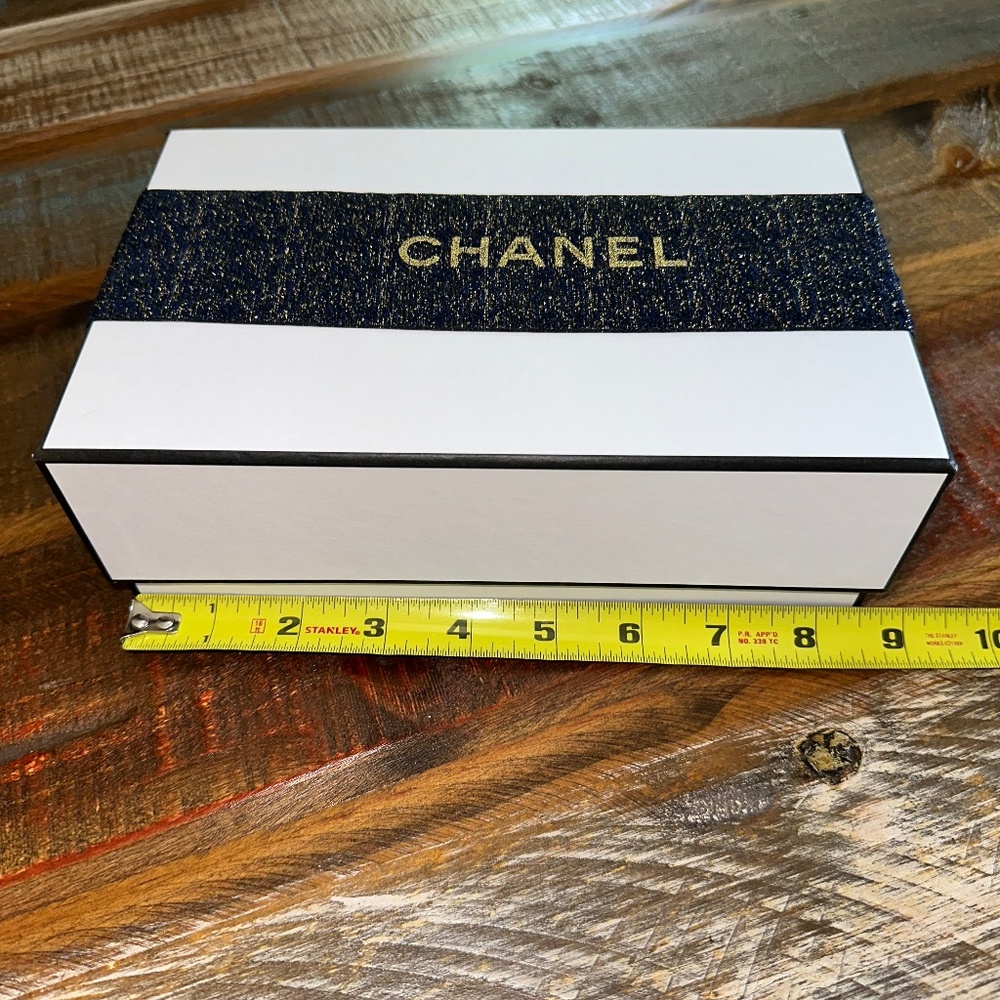 CHANEL empty gift box  8 1/2 x  5 approx size with elastic Black & Gold ribbon